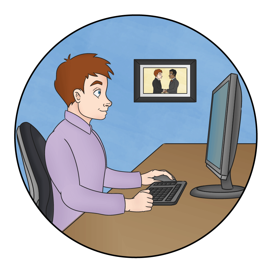 Man works at his desk with a picture of him and his husband on the wall